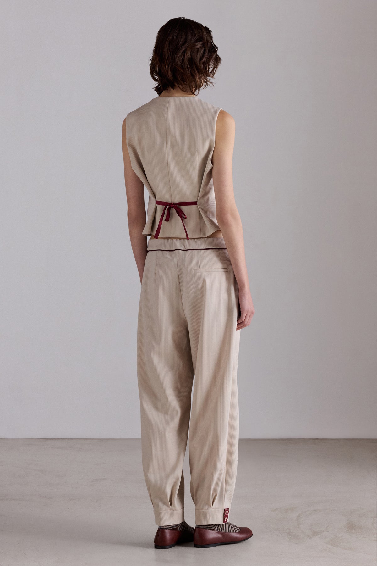 Vest with Embroidered Logo and Contrast Piping